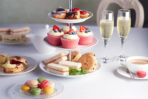 A selection of sandwiches and desserts for Afternoon Tea. Photo credit: hellengrasso.com